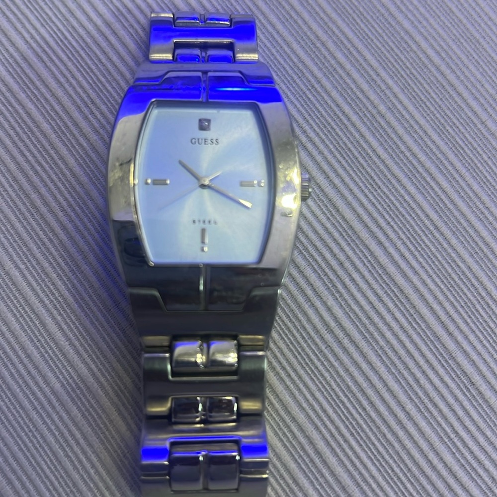 Silver light blue face guess watch
